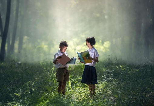 two children with books